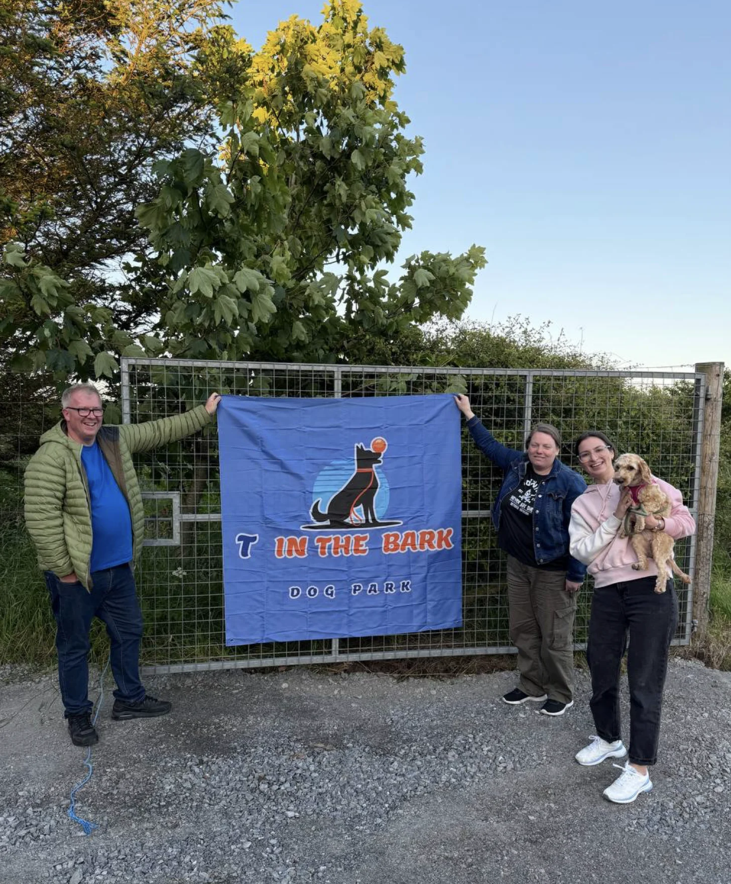 John and Lynne with their dog at T in the Bark Dog Park